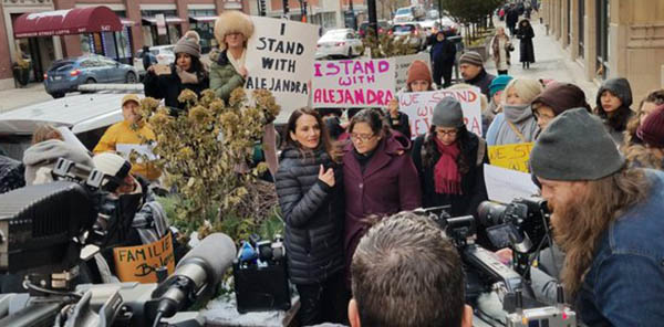 Photo of Alejandra Cano speaking during a press conference prior to her first CBP checkin