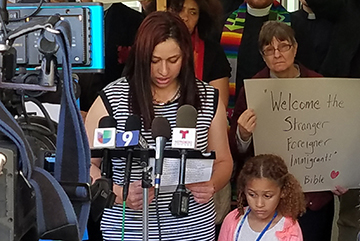 Paula and her daughter at a press conference.